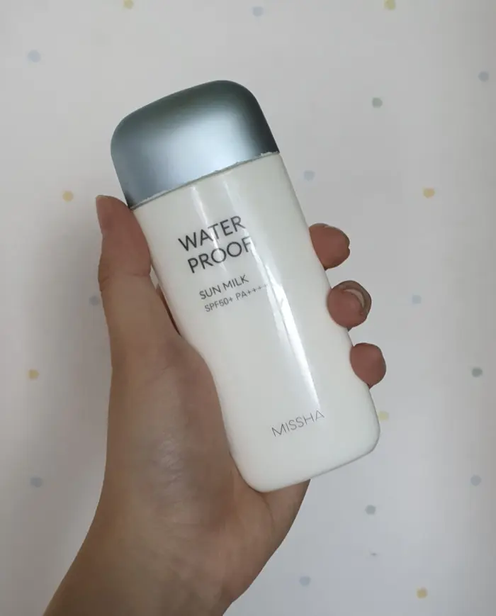 Missha All Around Safe Block Waterproof Sun Milk in hand